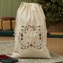 Personalised Folklore Christmas Natural Canvas Gift Sack, thumbnail 1 of 3