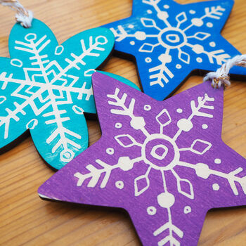 Star And Snowflake Linocut Wooden Christmas Decorations, 4 of 5