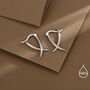 Minimalist Sterling Silver Tusks Hoop Earrings, thumbnail 1 of 11