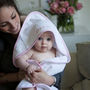 Personalised Baby Hooded Towel Edged In Pink Gingham, thumbnail 1 of 7