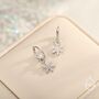 Sterling Silver Dainty Snowflake Huggie Hoop, thumbnail 3 of 10