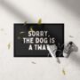 Sorry The Dog Is A Twat | Cream And Charcoal | Door Mat, thumbnail 1 of 2
