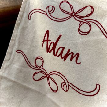 Personalised Christmas Eve Bow Sack Or Stocking, 5 of 9