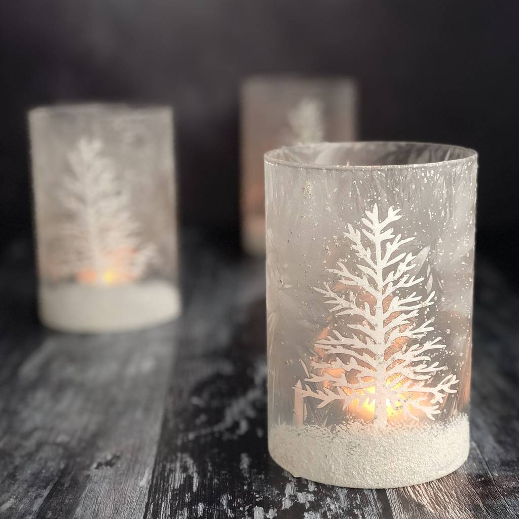 snow scene tea light holder by the christmas home