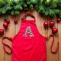 Liberty Of London Christmas Initial Children Apron Red, thumbnail 1 of 4