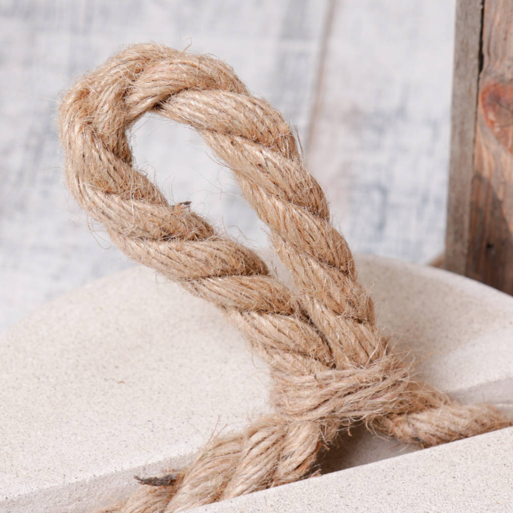 concrete circular door stop with rope loop handle by dibor