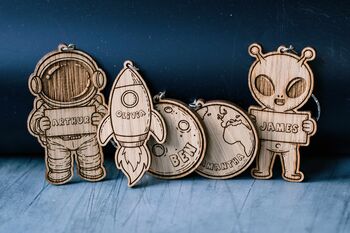 Personalised Space Themed Wooden Keyring | Astronaut, Rocket, Moon And Ufo Name Charm, 2 of 9