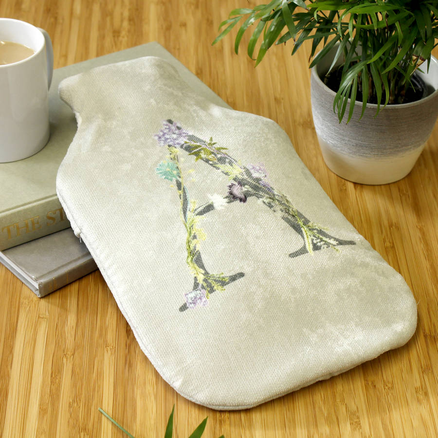 personalised name floral letter hot water bottle cover by gillian