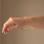 July Ruby Gold And Silk Birthstone Bracelet, thumbnail 3 of 6