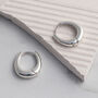 Sterling Silver Oval Huggies, thumbnail 1 of 4