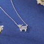 Tiny Highland Cow Pendant Necklace In Sterling Silver, thumbnail 1 of 12