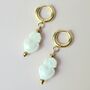 White Ceramic Sacred Heart Charm Huggie Earrings, thumbnail 2 of 4