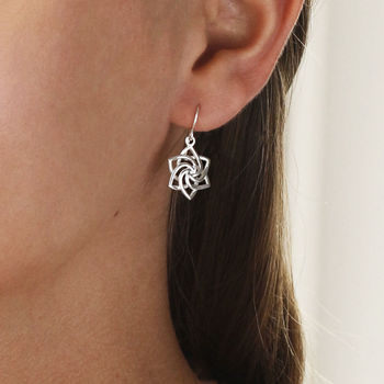Sterling Silver Dangly Swirling Star Earrings, 5 of 6