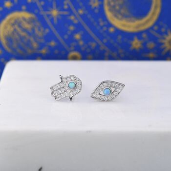 Mismatched Hamsa Hand And Evil Eye Cz Stud Earrings In Sterling Silver With Blue Opal, 7 of 12