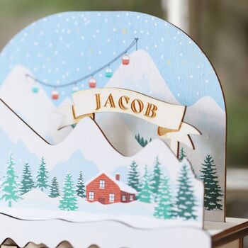 Personalised Wooden Snowy Hills Cutout Advent Calendar, 2 of 7