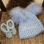 Personalised Baby Blue Double Pom Pom Winter Hat And Booties, thumbnail 1 of 9