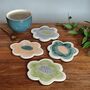 Handmade Flower Shaped Ceramic Coasters In Orange And Green, thumbnail 6 of 7