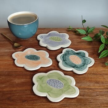 Handmade Flower Shaped Ceramic Coasters In Orange And Green, 6 of 7