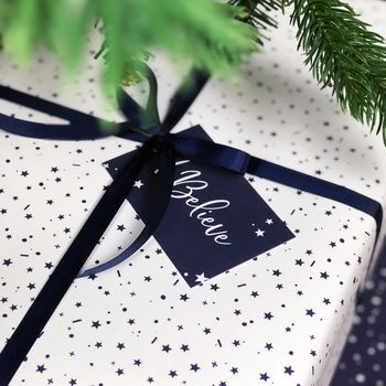 'I Believe' Christmas Stars Navy Wrapping Paper, 12 of 12