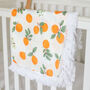 Orange Clementine Organic Bamboo Tassel Baby Blanket, thumbnail 1 of 3