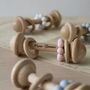 Personalised Round Wooden Baby Rattle, thumbnail 1 of 7