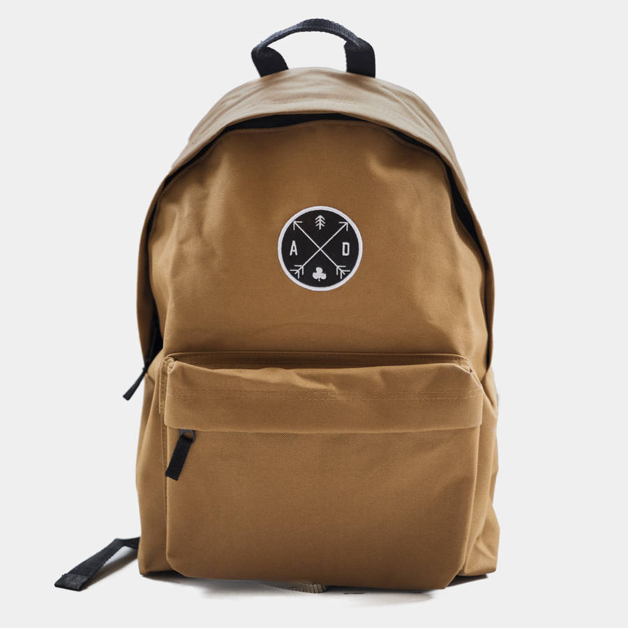 arrow emblem tan backpack by art disco
