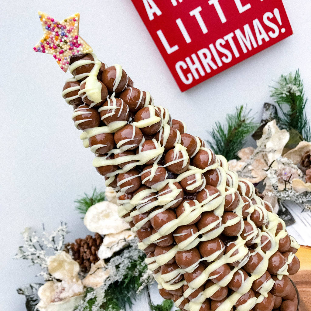 malteser christmas tree drizzle , with a chocolate star by sweet trees