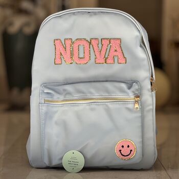Personalised Nylon Backpack With Patch Letters And Motifs With Gold Outline, 6 of 12