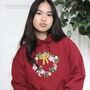 The Big Bow Embroidered Christmas Wreath Hoodie, thumbnail 1 of 6