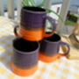 Set Of Four Reactive Glaze Brûlée Mugs In Purple And Orange, thumbnail 6 of 8