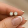 Sterling Silver White Opal Textured Stud Earrings, thumbnail 1 of 9
