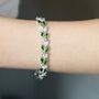 Crystal And Green Colour Leaf Design Tennis Bracelet, thumbnail 2 of 4