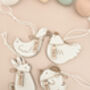 Set Of Four Personalised Wooden Easter Tree Decorations, thumbnail 1 of 7