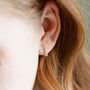 Sterling Silver Dotted Huggie Hoop Earrings, thumbnail 1 of 12