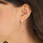 Sterling Silver Starburst Cz Heart Huggie Hoop Earrings, thumbnail 1 of 6