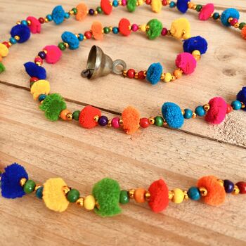 String Of Rainbow Pom Pom's With Brass Bell, 3 of 5