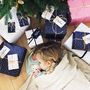 'I Believe' Christmas Stars Navy Wrapping Paper, thumbnail 9 of 12