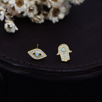 Mismatched Hamsa Hand And Evil Eye Cz Stud Earrings In Sterling Silver With Blue Opal, 2 of 12