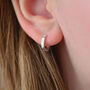 Gold Mini Cz Star Huggie Hoop Earrings, thumbnail 3 of 8