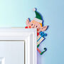 Cheeky Elf Door Frame Christmas Decoration, thumbnail 1 of 2