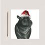 Carina The Hippo Festive Red Hat Christmas Card, thumbnail 2 of 5