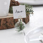 Glass Bauble With Green Foliage Place Card Holders, thumbnail 1 of 3