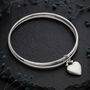 Personalised Heavy Sterling Silver Double Bangle With Heart Charm, thumbnail 1 of 8