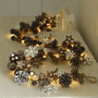 Stars And Snowflakes Pinecone Light Garland, thumbnail 1 of 2