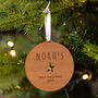Personalised Baby's First Christmas Wooden Bauble, thumbnail 3 of 6