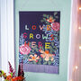'Love Grows Here' Embroidered Banner, thumbnail 1 of 5