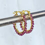 Gold Oval Hoop Earrings With Garnet Gemstones, thumbnail 4 of 5