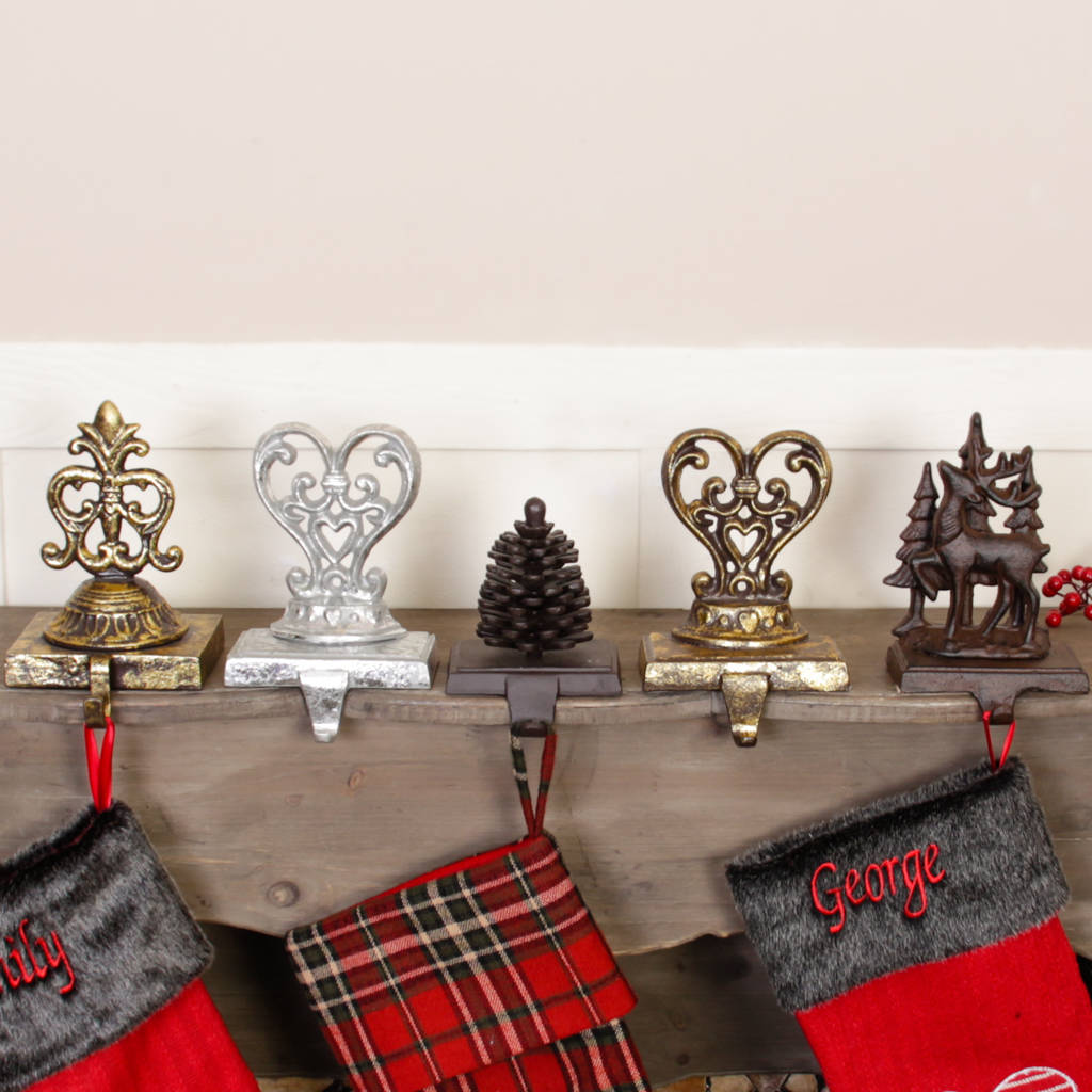 cast iron christmas stocking holder hangers by dibor