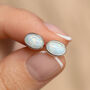 Sterling Silver White Opal Oval Stud Earrings, thumbnail 1 of 9