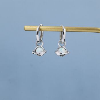 Sterling Silver White Opal Planet And Star Huggie Hoop Earrings, 2 of 11